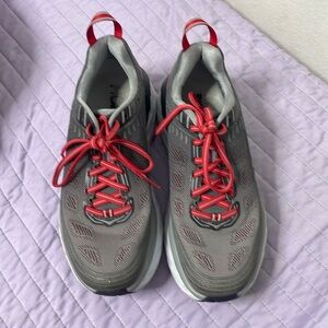 Hoka gray, and red running shoes size 7.5